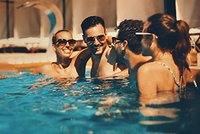 People Enjoying the Pool People Enjoying the Pool